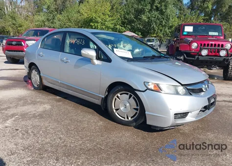 2010 Honda Civic Hybrid z USA, uszkodzony, nr VIN JHMFA3F28AS004965
